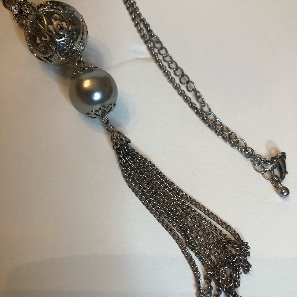 20” silver Tassel necklace with a large pearl and a large silver ball
